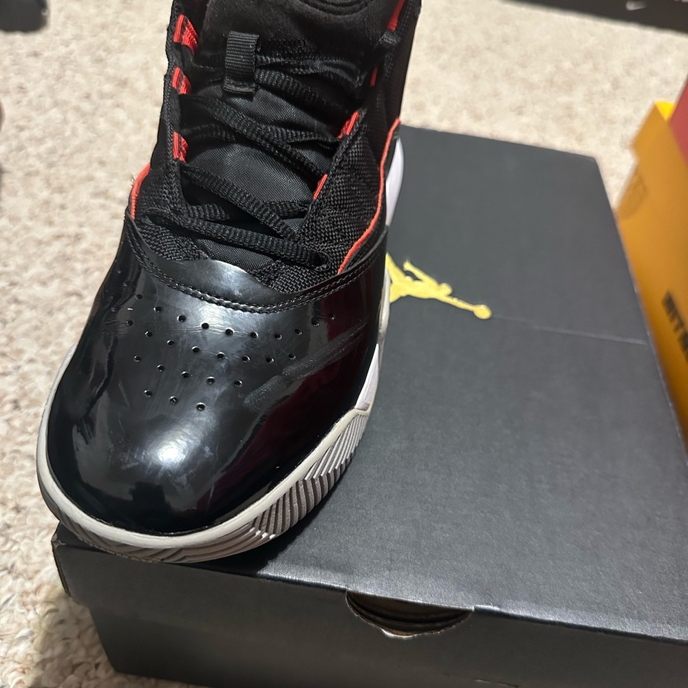 Jordan Stay Loyal Black and Red Sneakers
